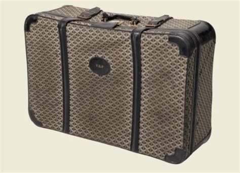 who owns goyard suitcase.